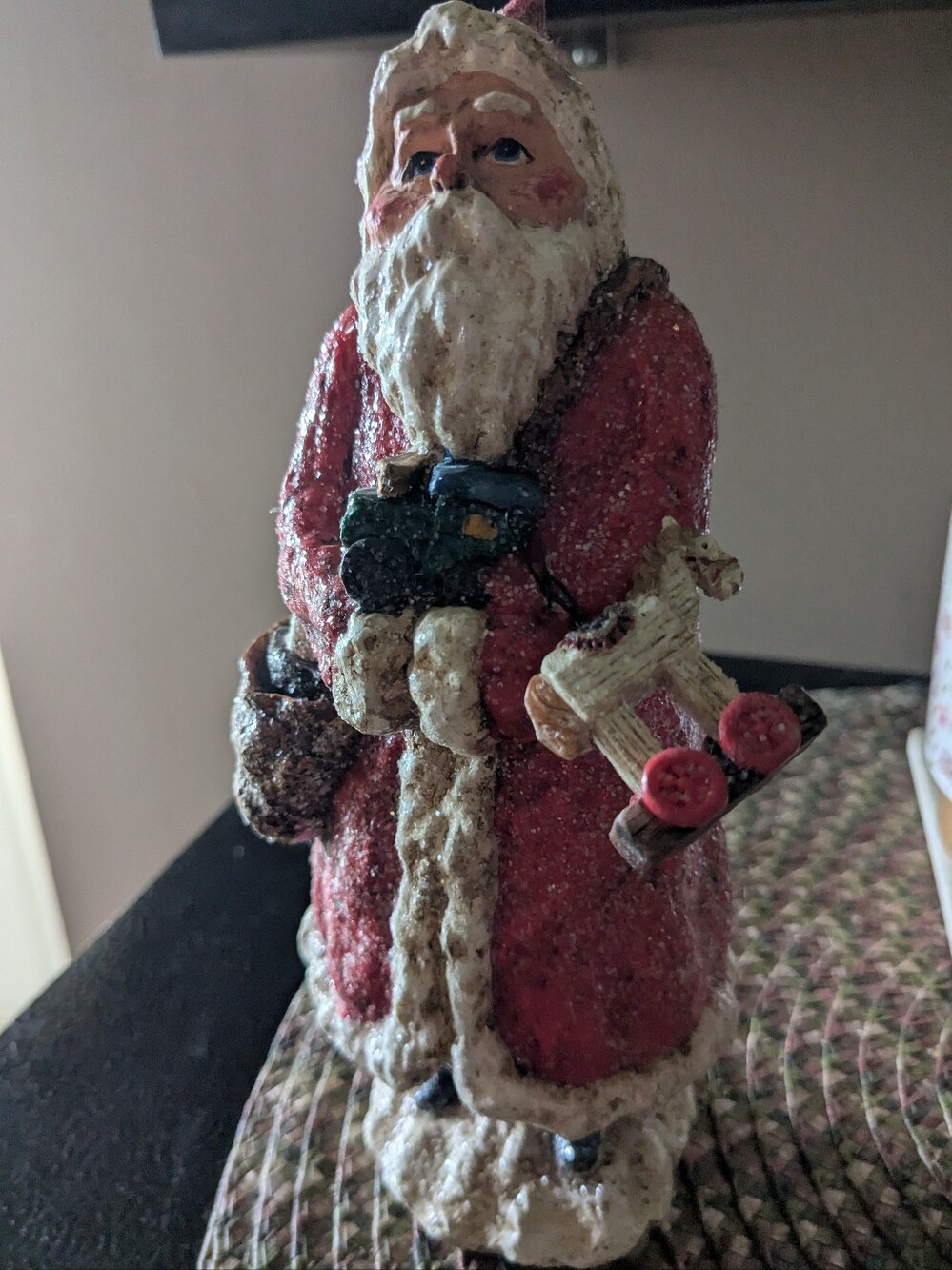 Festive Red Santa Holiday Figurine with Vintage Toy Details